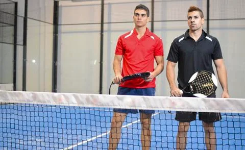 Paddle tennis couple Stock Photos