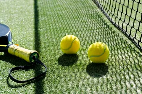 Paddle tennis objects and sunlight shadow Stock Photos