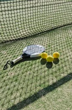 Paddle tennis  objects with hard sun shadow Stock Photos