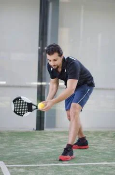 Paddle tennis serve Stock Photos