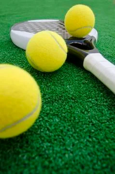 Paddle tennis wide angle objects on turf Stock Photos