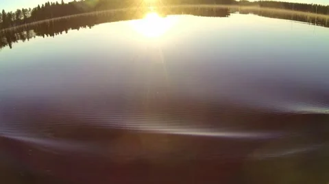 Paddle touching water surface and dropping water drops while kayaking during Stock Footage 67989189