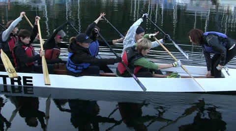 Paddlers In Long Canoe Beginning Practice Run Stock Footage 22639013