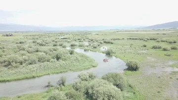 Paddling aboard a Hammocraft down a River Stock Footage 85625563