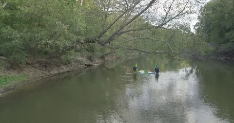 Paddling aboard a Hammocraft down a River VIII Stock Footage 85626105