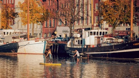 Paddling activity on the surface of the River Trave, Lubeck, Germany Stock Footage 120575367