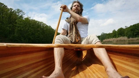 Paddling the boat Stock Footage 107268614