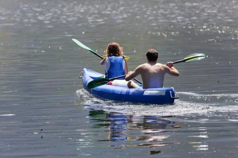 Paddling in canoeing. Stock Photos