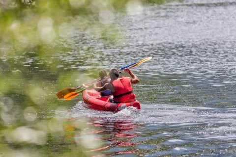 Paddling in canoeing. Stock Photos