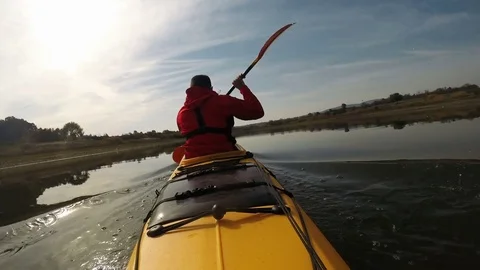 Paddling the kayak Stock Footage 81586747