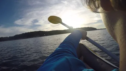 Paddling kayak at sunset Stock Footage 82394383