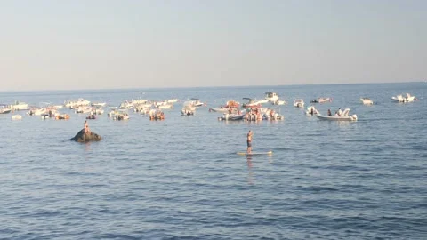 Paddling in the middle of the sea Stock Footage 138700656
