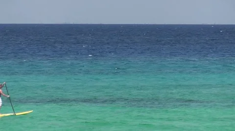 PADDLING IN OCEAN Stock Footage 2373623