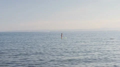 Paddling in the sea Stock Footage 138700549