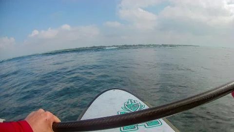 Paddling towards shore Stock Photos