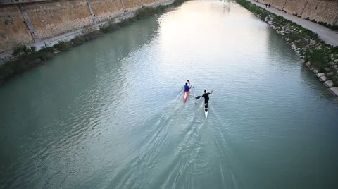 Paddling two boats in a river Vídeos de archivo 61279349