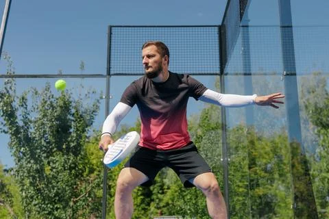 Padel Player Hitting Ball During Outdoor Tennis Training Session Stock Photos
