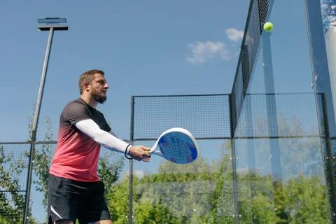 Padel Player Practicing a Forehand Volley During Outdoor Court Training Stock Photos