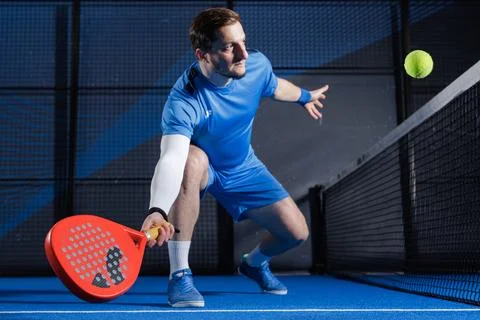 Padel Tennis Training Session with Racket and Ball on Court Stock Photos