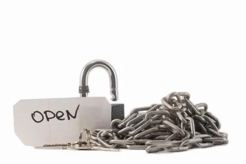 Padlock and keys on a white background. The lock is not locked Stock Photos