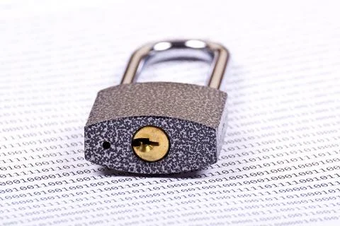 The padlock on the binary code Stock Photos