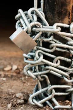Padlock on chain Stock Photos