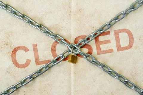 Padlock with a chains on the warning red stamp with word CLOSED Stock Photos
