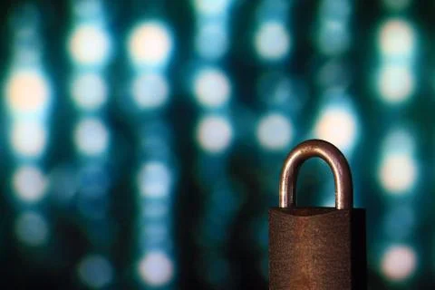Padlock closed. padlock placed in front of circular defocus bokeh light. digi Stock Photos