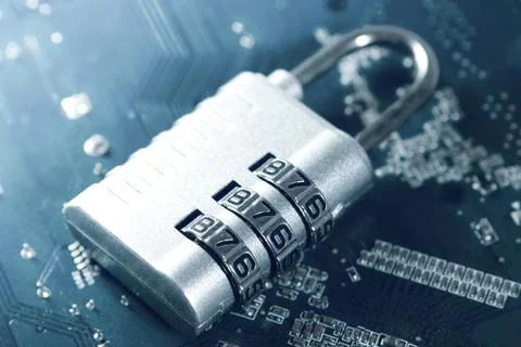 Padlock on computer circuit board. cyber security concept Stock-Fotos