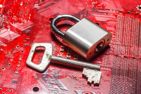 Padlock on a computer circuit board 스톡 사진