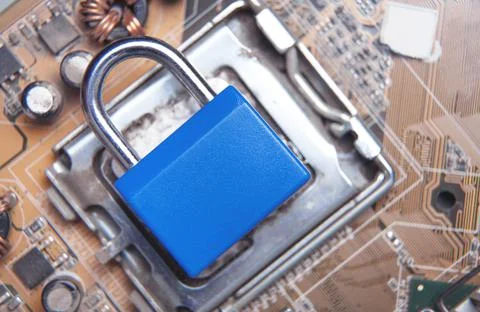 Padlock on computer circuit board. Security concept Stockfoto's