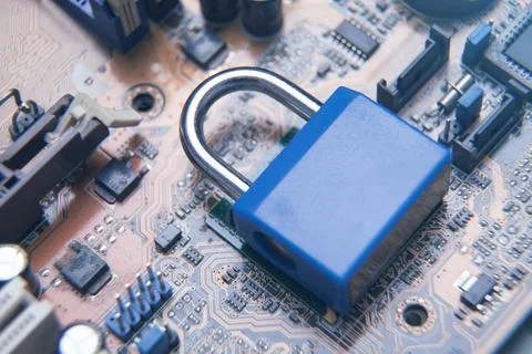 Padlock on computer circuit board. Security concept 스톡 사진