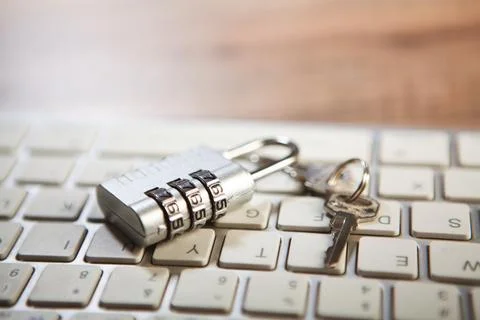 Padlock on a computer keyboard. Cyber security and data protection concept. Stock Photos