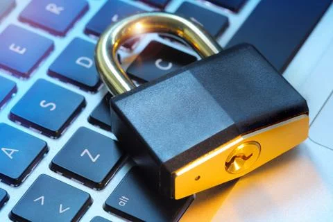 Padlock on computer keyboard Stock Photos