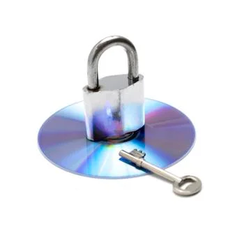 Padlock on dvd dish Stock Photos