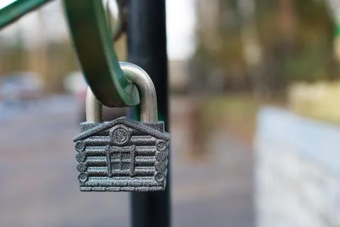Padlock in form of house Stock Photos
