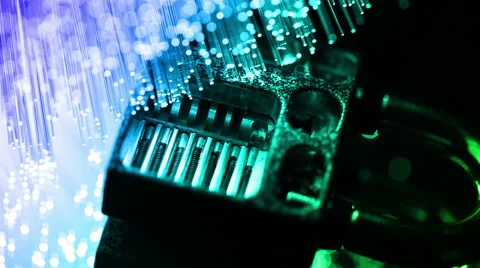 Padlock inside, and fiber optical technology background, shot in HD video Stock Footage 66335627