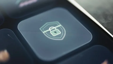 Padlock inside a shield displayed on an investment control panel Stock Footage 342489196