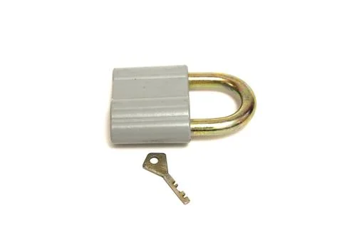 Padlock with key isolated on white background Stock Photos