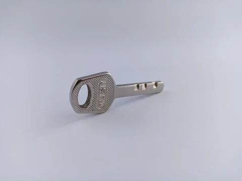 Padlock key Stock Photos