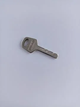 Padlock key Stock Photos