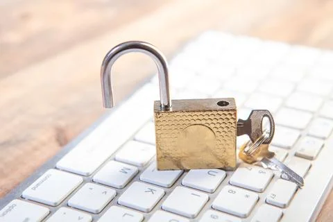 Padlock on the keyboard, computer security Stock Photos