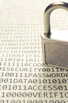 Padlock is on the list with a binary code Stock Photos