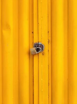 Padlock locking a gate Stock Photos