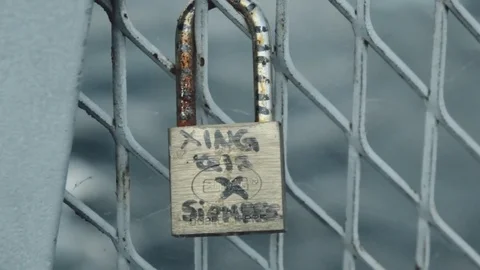 Padlock with Love in Bridge Stock Footage 78766930