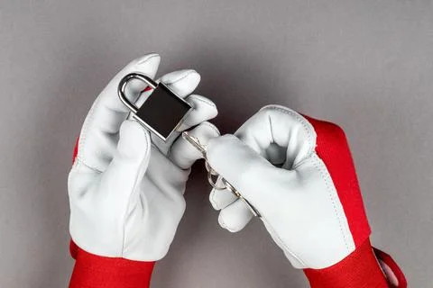 Padlock in a man's hands. Security and protection measures concept Foto stock