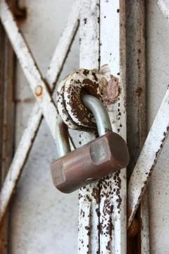 Padlock on an old gate Stock Photos
