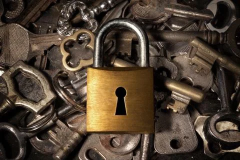 Padlock over keys Stock Photos