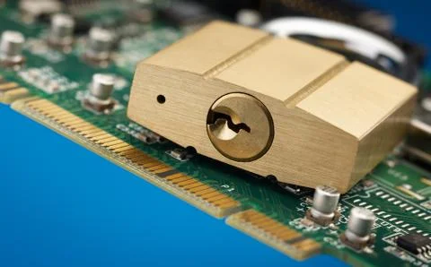 Padlock on printed circuit board Stock Photos