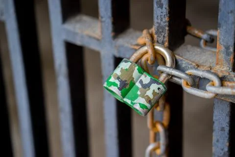Padlock on a rusty door Stock Photos